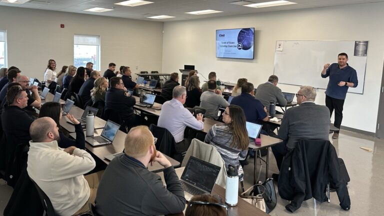 Noah Campbell leaders an exercise on cybersecurity.