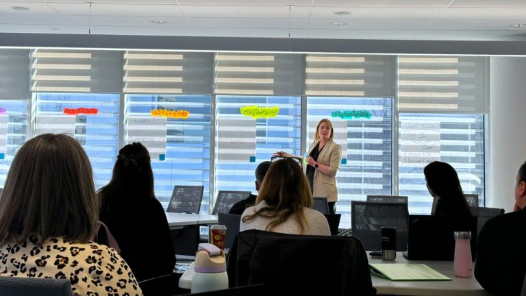 Laura facilitating the solution brainstorming session during a cybersecurity tabletop exercise.