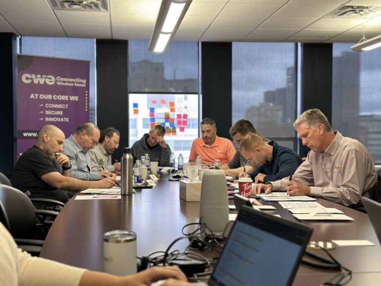 Professionals engage with an activity during a creative thinking session hosted by CWE.