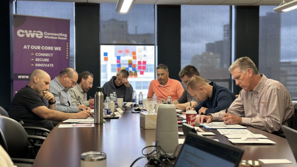 Professionals engage with an activity during a creative thinking session hosted by CWE.