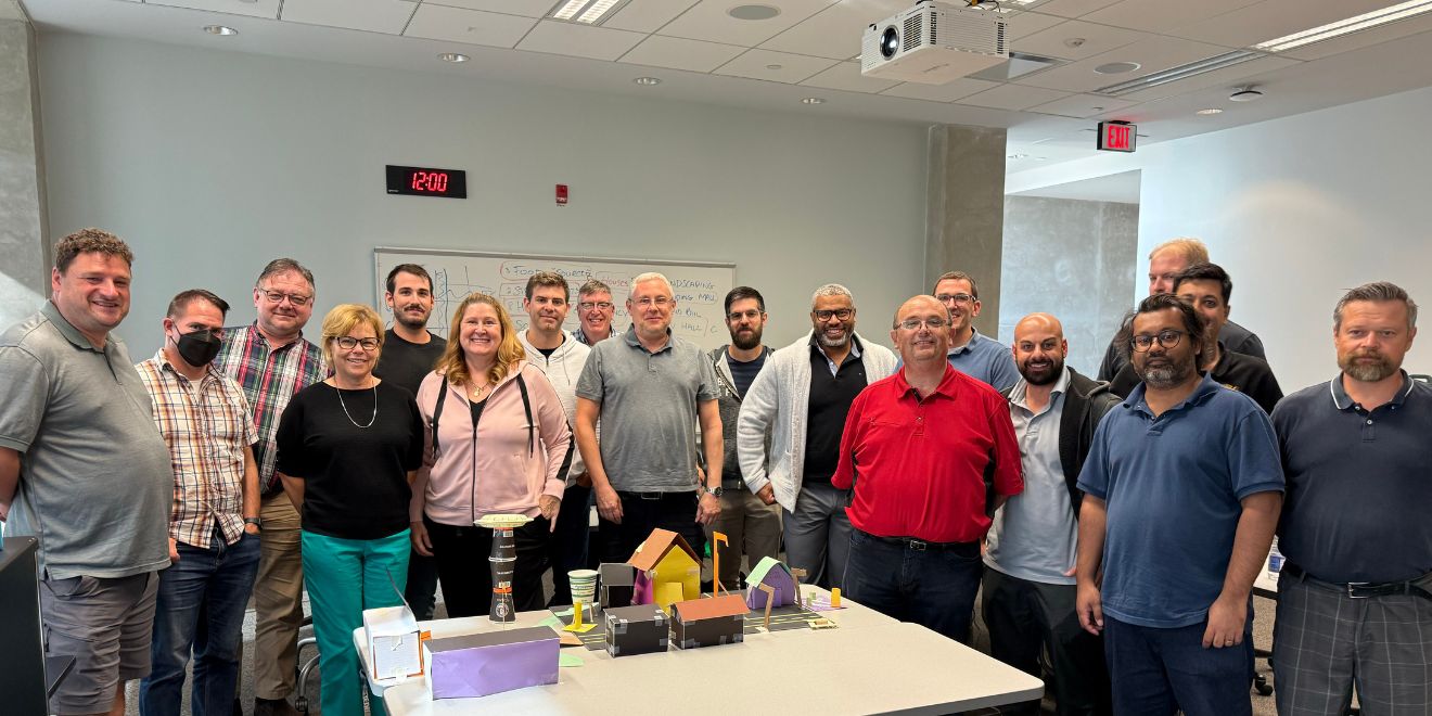 Blog Scrum Group 1_UoW_20260313 Large group of people standing for a photo after a workshop
