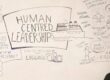 woman looking at an example of visual thinking, a large diagram titled "Human Centred Leadership"