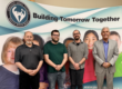 GECDSB team in front of banner